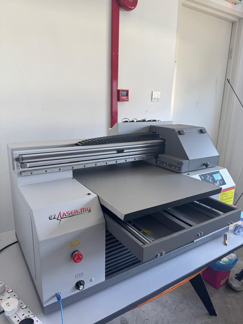 Freshly delivered ezLASER.my UV printer unit at a customer site